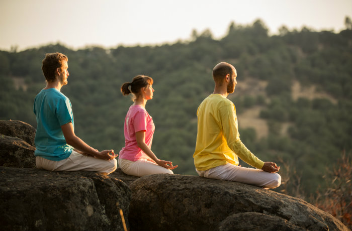 Three Yogis Meditating on top of Siva Hill